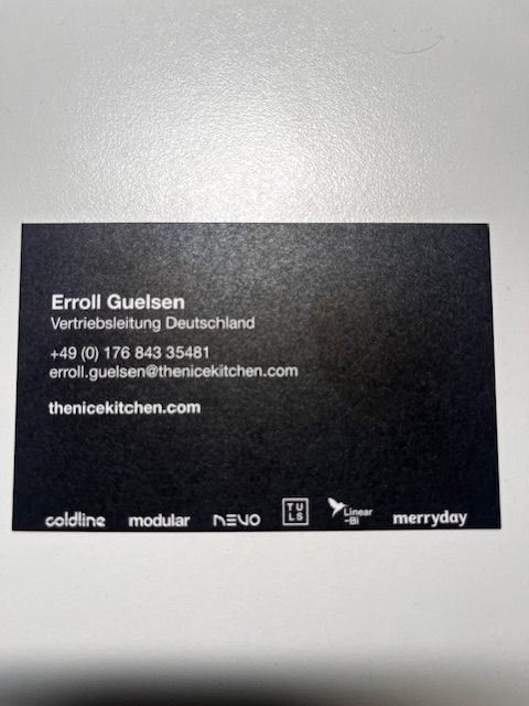 TNK Visitenkarte von Erroll Guelsen 